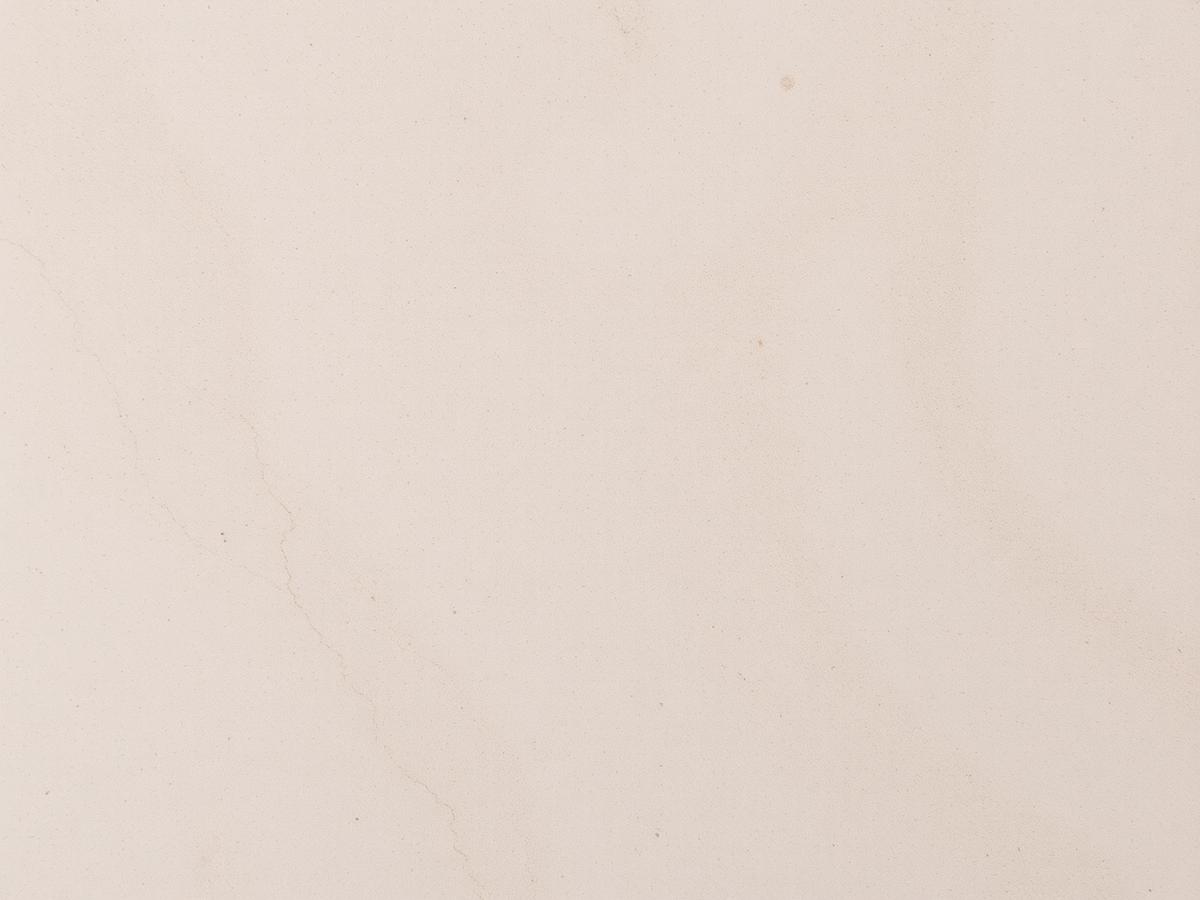 Superfície de limestone bege com textura fosca e suave